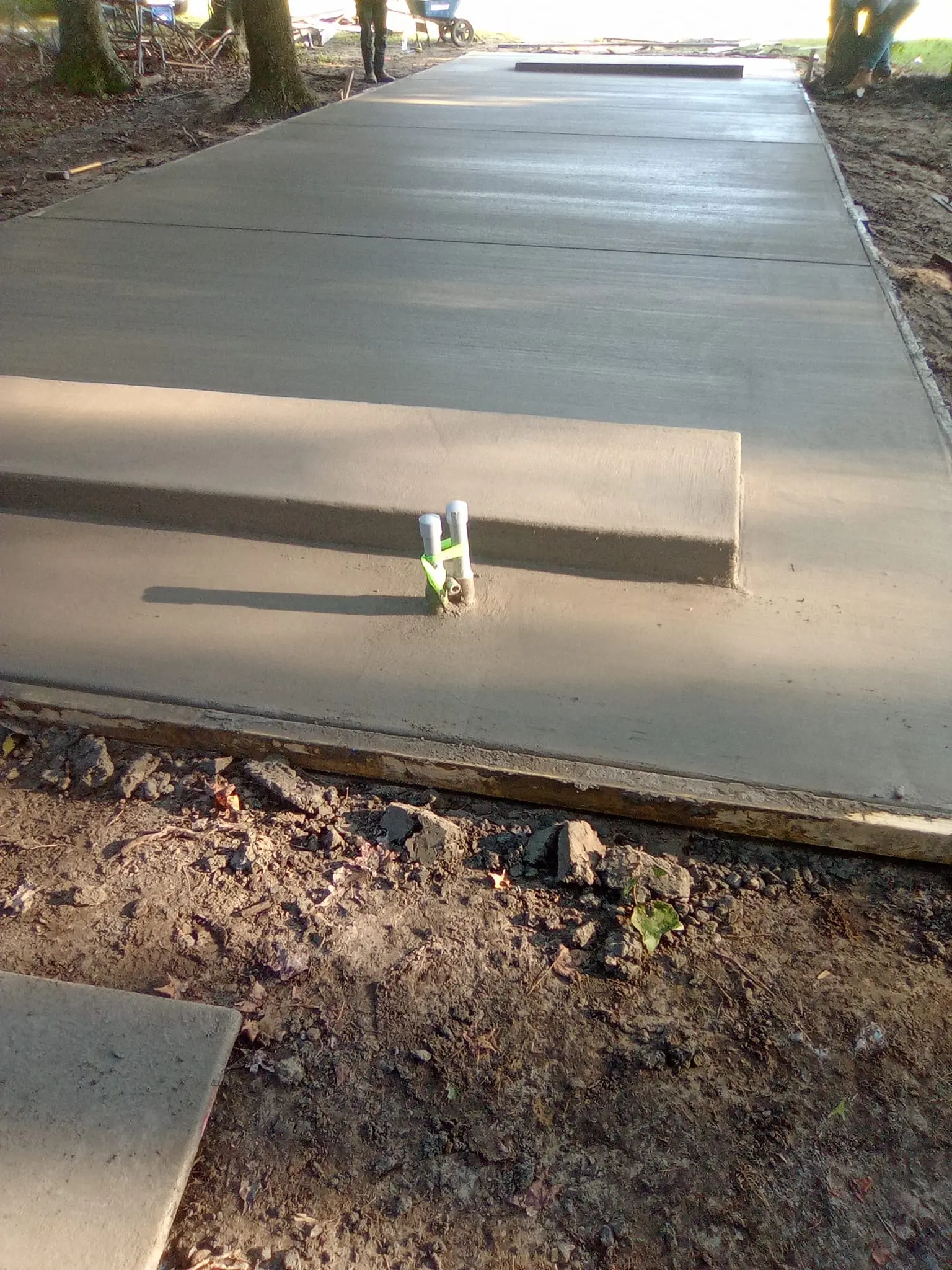 Freshly poured residential concrete driveway in Jacksonville, NC